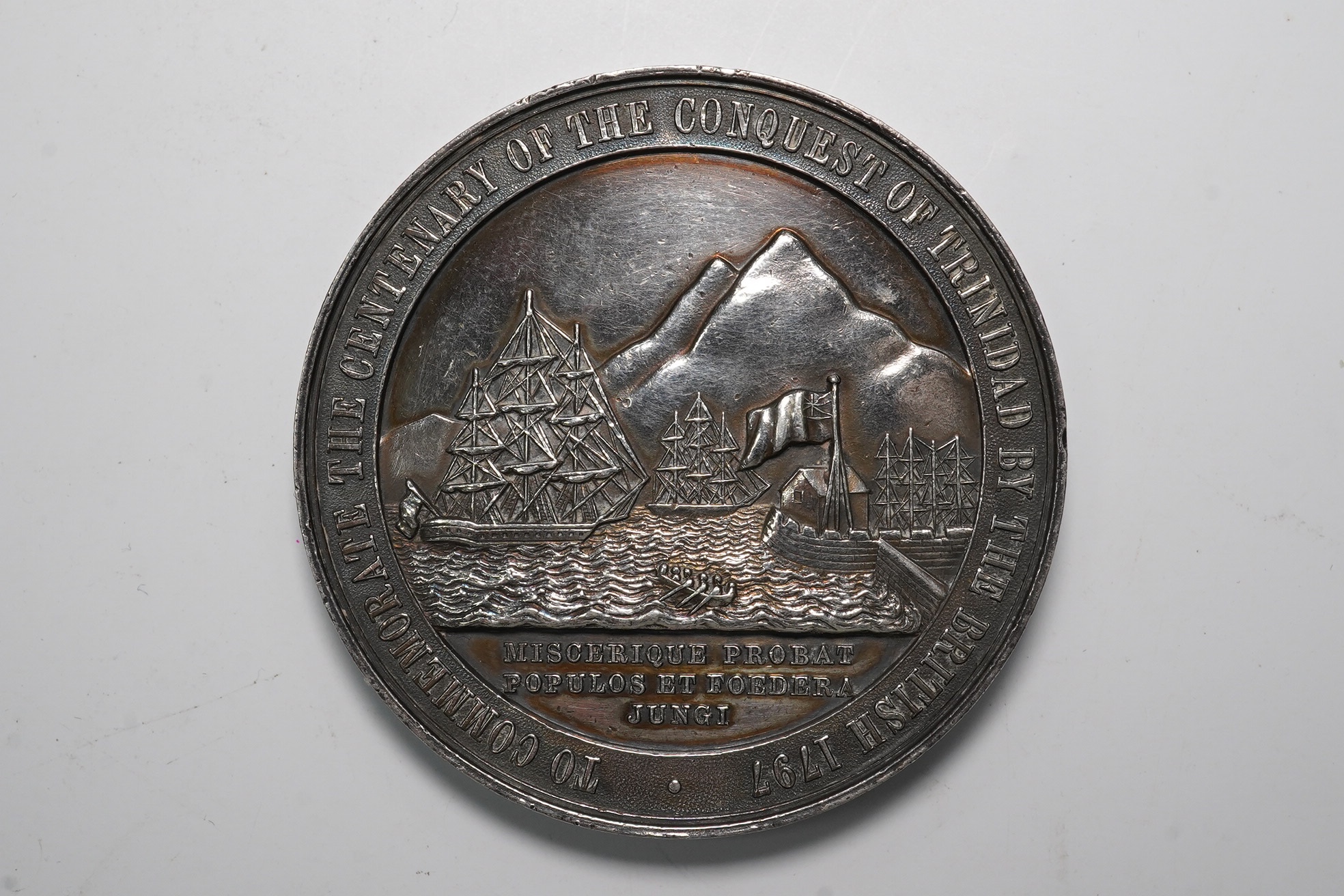 Commemorative medals, Trinidad, Centenary of the Capture of Trinidad silver medal, 1897, unsigned, uniformed bust of Sir Ralph Abercromby facing, rev. two ships outside Port of Spain, 48mm (BHM 3623; Roehrs 1625), about